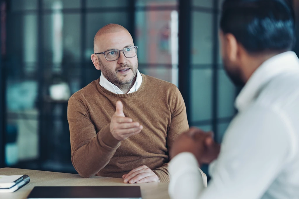 Advisor at desk or in meeting